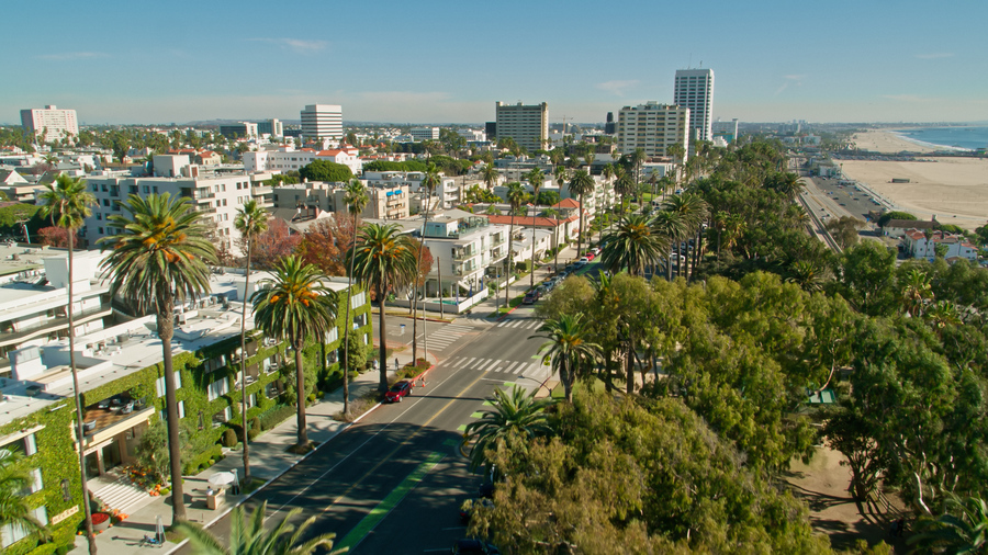 Aerial establishing shot of Santa Monica, California on a sunny day.